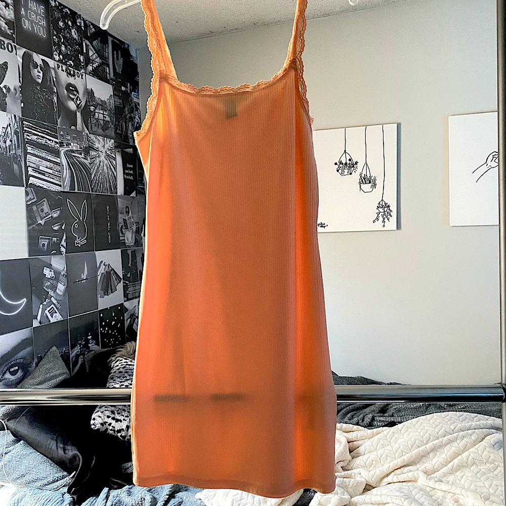 coral colored mini dress with lace trim